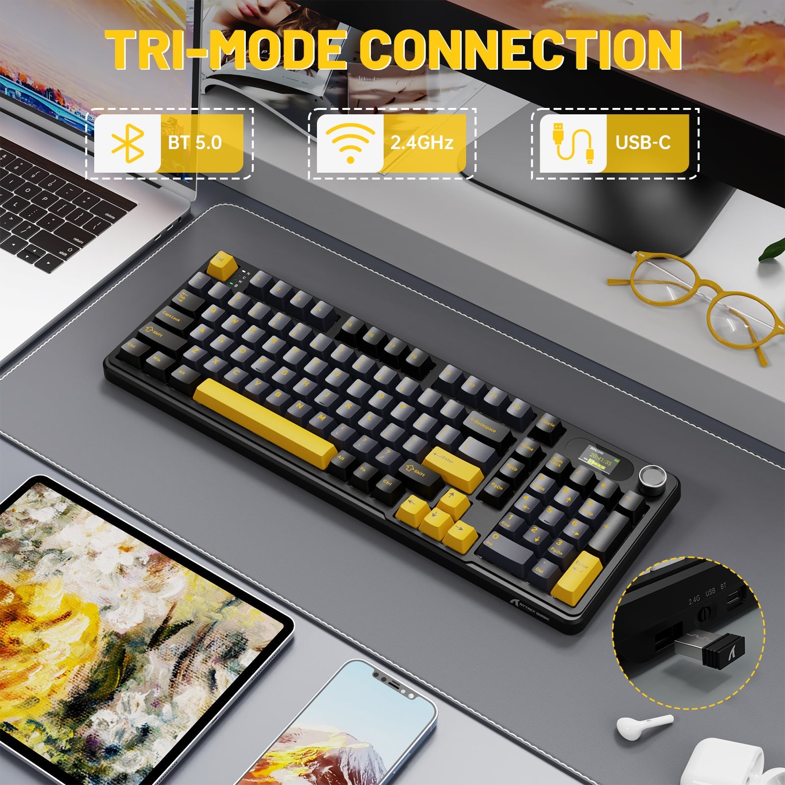 Mechanical keyboard with tri-mode connection options on a desk setup.